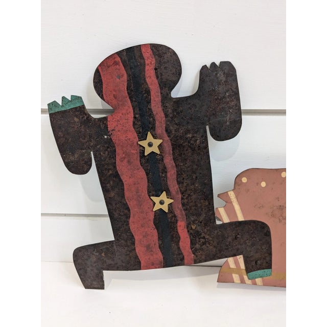Experience the essence of Santa Fe's folk art tradition with this original Ivan Barnett sculpture. Crafted from a...