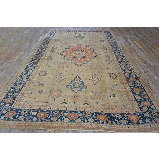 An elegant room-sized Antique Persian Mahal carpet, circa 1930. Measuring 8' 10" x 14' 5", this piece is distinguished by...