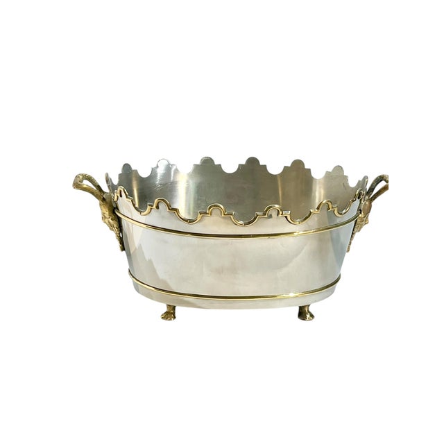 Elegant and eye-catching, this neoclassical-style rafraichissoir (wine cooler) features a silver plate body accented with...