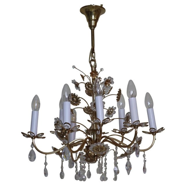 This beautiful chandelier with the finest lead crystal comes from palwa. Its crystal blossoms and numerous candles make it...