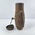 Milk container with a removable beaded lid. Has an animal hide strap to carry it. Hand-carved wooden milk container made...