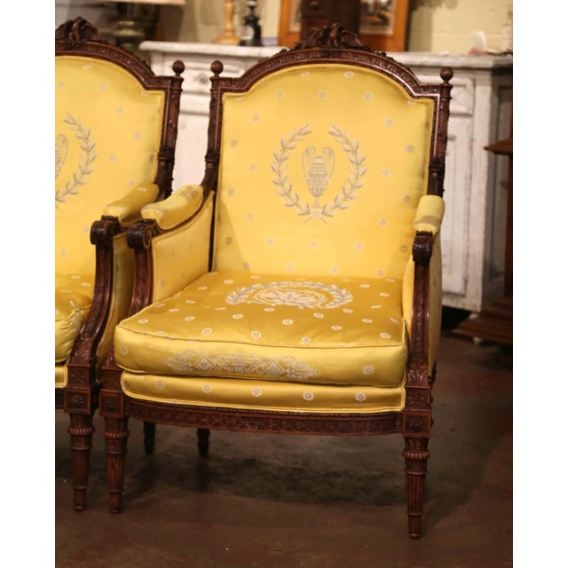 19th Century French Louis XVI Walnut Bergères With Carved Eagle Crest For Sale - Image 4 of 12