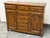 Design Plus Gallery presents a Traditional Distressed Oak Eight-Drawer Entree/Buffet. Constructed from wood in a honey-...