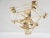About this item Gold colored chandelier with glass pendants. Some have some chips from the glass. The lamp uses 7 E14...