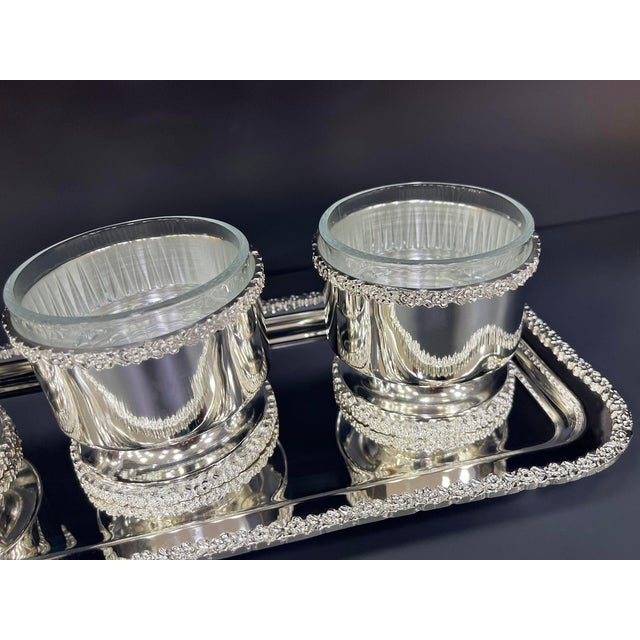 Add a touch of elegance to your table with this luxury 7-piece serving set, featuring bright silver-tone brass bases with...