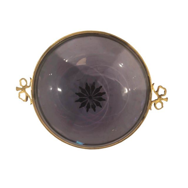 A lovely French amethyst Hollywood Regency dish circa 1940s encased in bronze ormolu with bow handles and a star in the...
