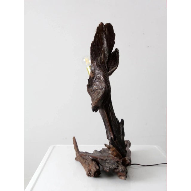 This is a vintage handcrafted driftwood table lamp. The organic modern art piece has a single bulb. Height: 24.5" .. 62.2...