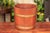 An English Edwardian period R.A Lister & Co. oak bucket with brass braces. This charming English Edwardian period oak...