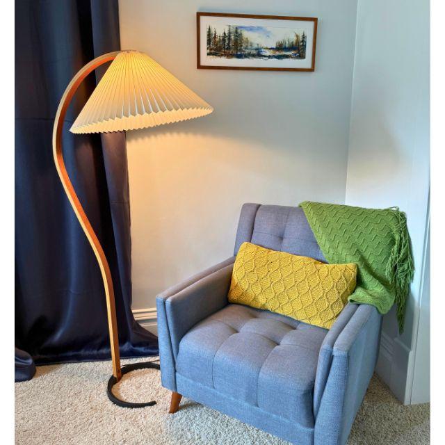 A stunning 1970s bentwood floor lamp by Mads Caprani AS, a renowned Danish manufacturer. The bentwood lamp sits on a...