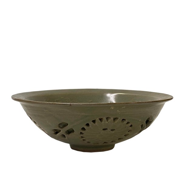 This is a handmade Chinese accent decorative art made of ceramic in celadon green-gray color with an underlay floral...