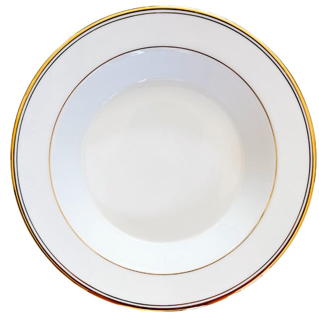 Set of twelve gold rimmed soup bows by Dansk from the Concerto Gold collection designed by Niels Refsgaard and discontinued.