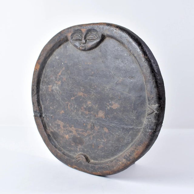 The Yoruba divination plate, Opon Ifa, is a circular wooden tray used in Ifa divination, a spiritual practice of the...