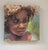 This oil painting on cradled wood panel captures a young child's contemplative expression, accentuated by soft, textured...