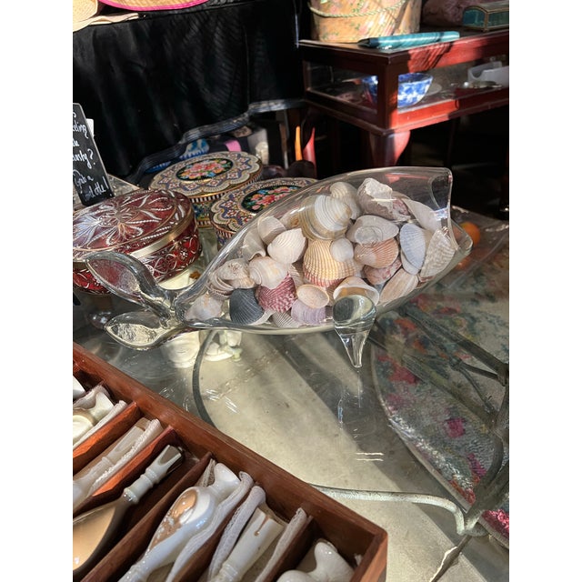 Up for consideration is a beautiful vintage blown glass fish decorative bowl with shells. This would look lovely in your...