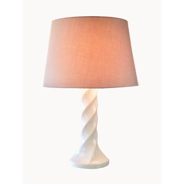 Sexy, sculptural tall gradient twist from white ceramic body. Consistent overall glaze which has one small chip on back of...