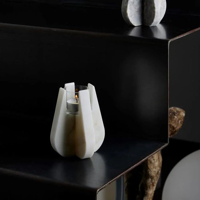Drop in Carrara white marble in the T -light candle holder variant contains the strength of marble and the lightness of a...