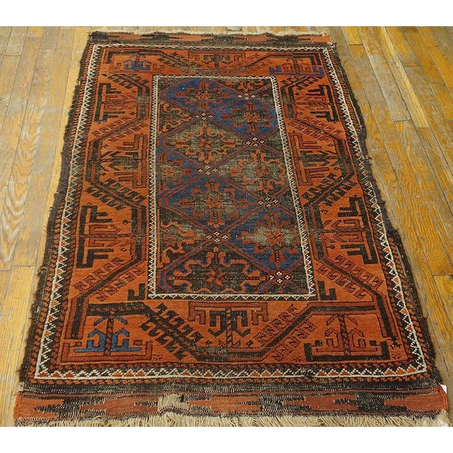 Antique Baluch Rug measuring 3' x 5'4" - 91 x 162 cm Antique Baluch Persian Brown 1900s Rug, Circa Date: 1900s. This...