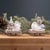 Add a touch of winter magic to your home with these charming Gnome on Sled Figurines. Hand-painted with wintry blue and...