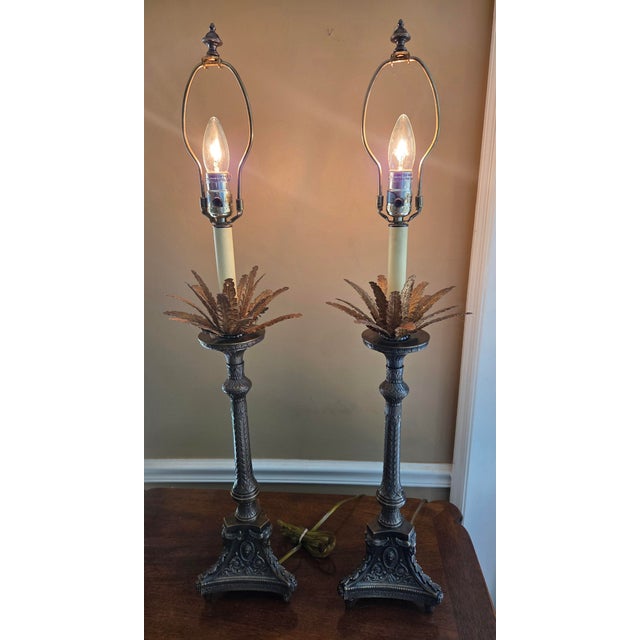 Rich looking pair of vintage candlestick lamps from the 1980's. They were designed by Raymond Waites for Tyndale, a...