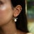 Elevate your style with the timeless elegance of our Royal Sapphire Pearl Drop Earrings. Handcrafted with bronze and...