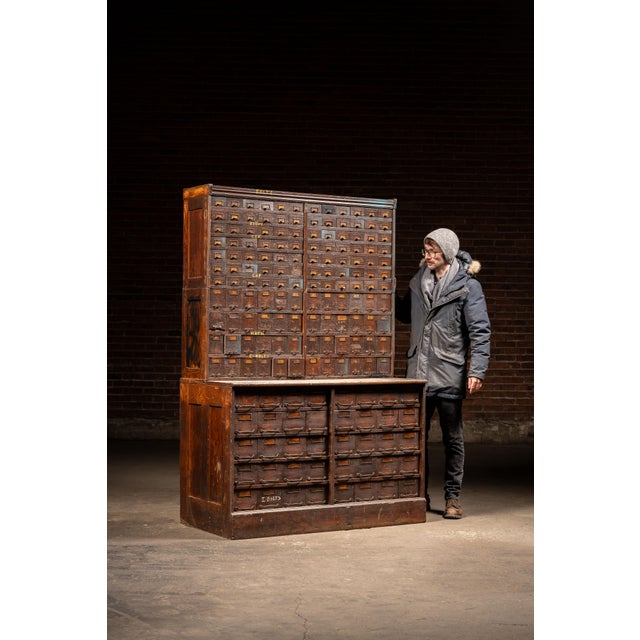 c. 1900s/1910s; (likely) W. C. Heller & Co. - Montpelier, OH Massive, floor-standing industrial hardware cabinet...