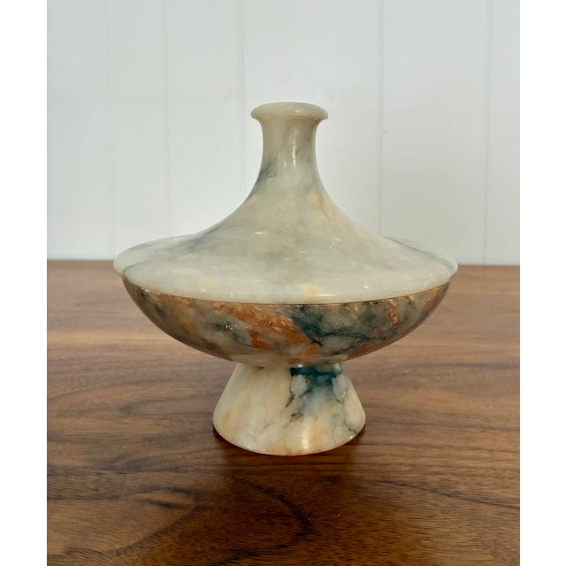 Gorgeous lidded alabaster catch all on pedestal base. White base with beautiful coral and black veining.