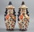 A decorative pair of English porcelain vases and covers by Ridgways, produced in the post-1891 period and decorated in the...