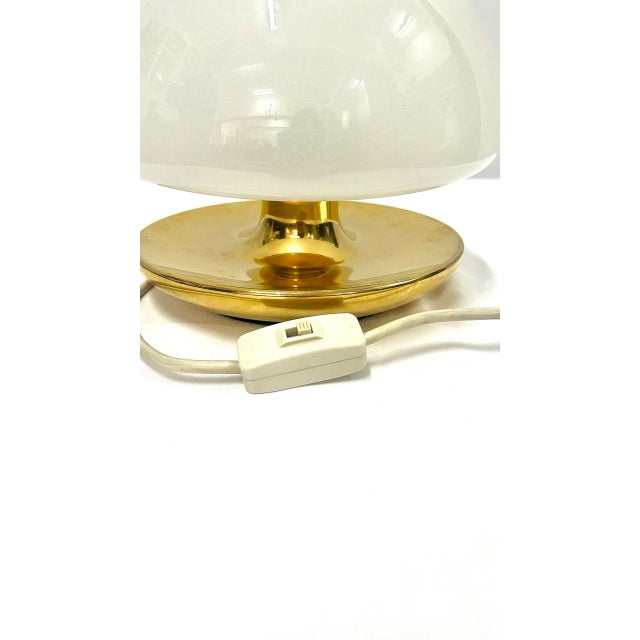 "VP" table lamp, produced by Sirrah, designed by Vittorio Balli and Romeo Ballardini in the 1970s. Polished brass base and...