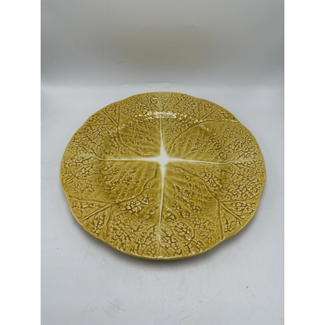 This is a ceramic platter by Secla, a well-known Portuguese pottery manufacturer. The platter features a leaf-inspired...