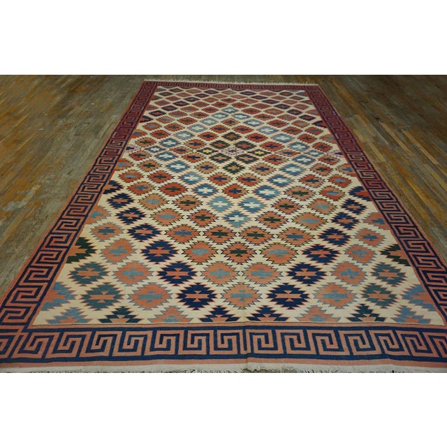 Antique Dhurrie rug, size: 8' 9''x 13' 8''. Antique Dhurrie Indian Medallion Flat Woven Rug, Circa Date: 1940s. This...