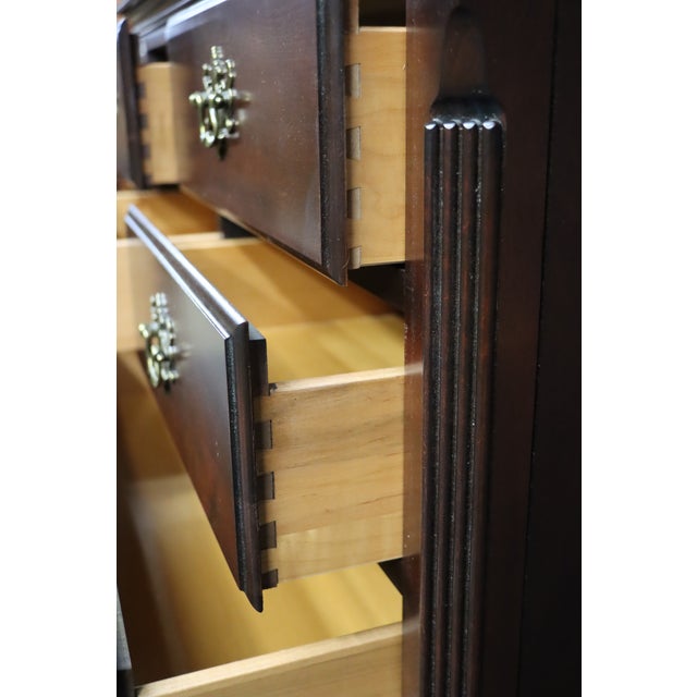 Classic Kincaid Furniture gentleman’s chest crafted in cherry with a rich finish. Features multiple drawers with brass...