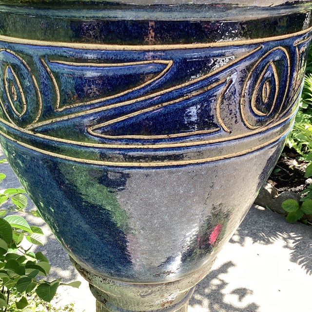 This Mediterranean Style Pottery Studio Cobalt Blue Glazed Ceramic Planter features an incised Tan Scroll pattern, adding...