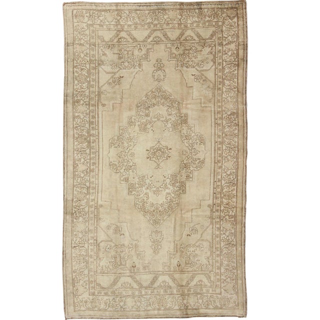 Floral Vintage Turkish Oushak Rug With Design in Ivory, Taupe, and Brown For Sale