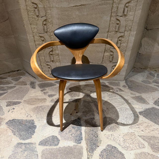 For your consideration, an iconic Norman Cherner Molded Plywood Armchair, widely known as the "Pretzel" chair. Designed by...