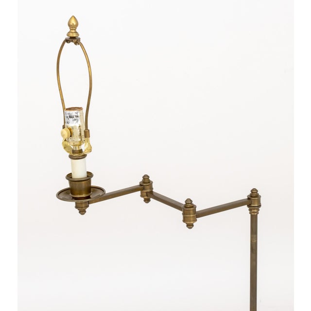Modern Brass Swing-Arm Floor Lamp, with articulated arm. 55" H x 12.5" W x 9.5" D. Provenance: The Estate of Gilbert C....