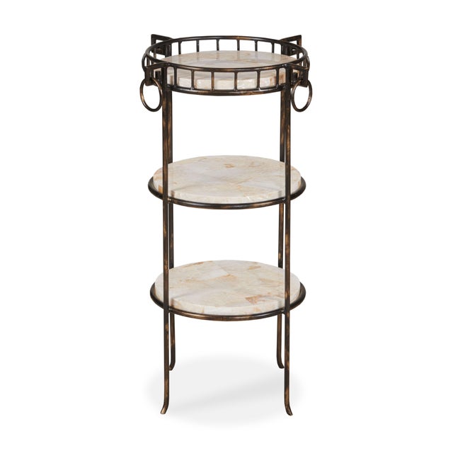 This elegant three-tier stand pairs a hand-forged wrought iron frame with white shell inlay shelves for a sophisticated...