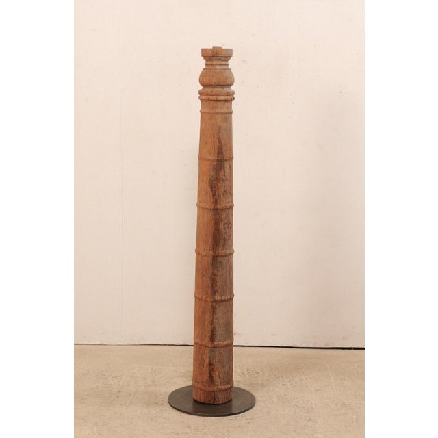 A single 19th century British Colonial carved wood column with custom stand. This antique hand-carved wooden architectural...