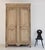Early 19th-century French provincial wardrobe or armoire. Crafted from solid oak with a beautiful bleached finish. A fine...