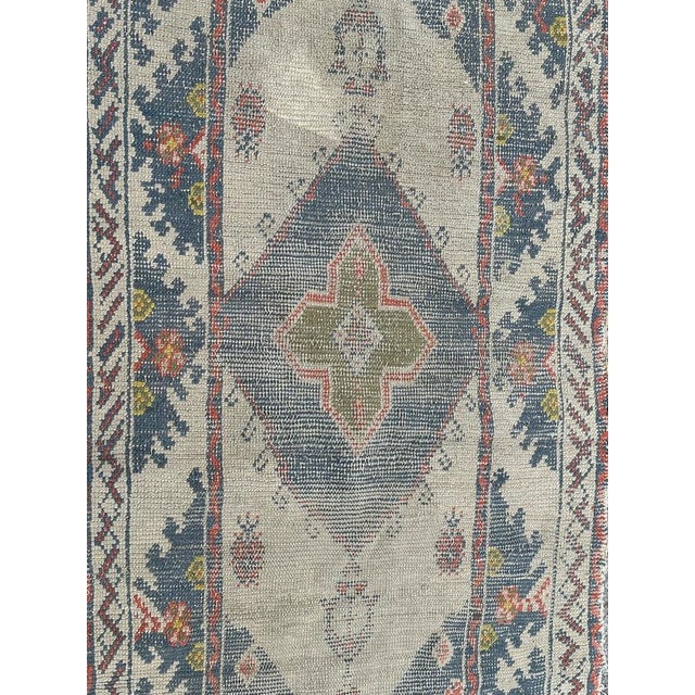 Nice small antique distressed Turkish oushak rug with a decorative design and nice light colours with white on background,...