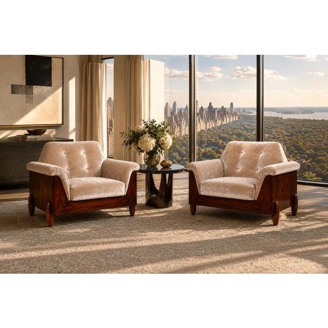 A striking pair of Brazilian Modern armchairs by JD Móveis, dating to the 1960s, distinguished by their sculptural...