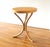 This is a an elegant mid century modern martini table by Thonet. It has a round caned top on wood, with a curved bentwood...