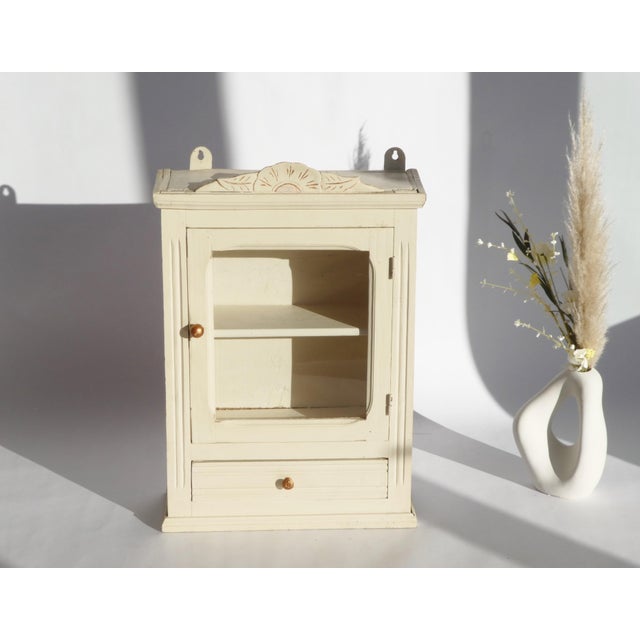 Vintage Rustic Beige Apothecary Cabinet with Glass Door, Carved Floral Ornaments, Shelf and Drawer For Sale - Image 10 of 10