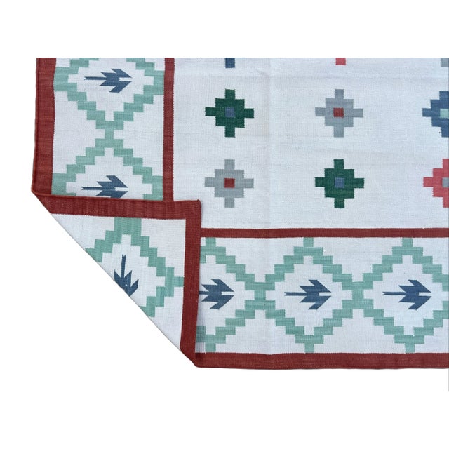 Casa Cosima Handmade Cotton Flat Weave Area Rug, Star Patterned White Green & Terracotta Dhurrie - 6'x9' For Sale - Image 4 of 11