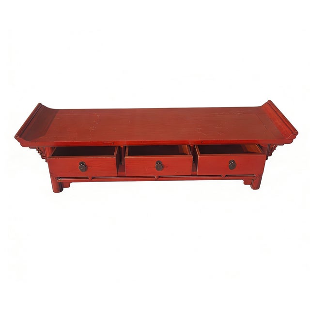 This low (17 inch) console table features a distinctive everted-end tabletop, a silhouette traditionally associated with...