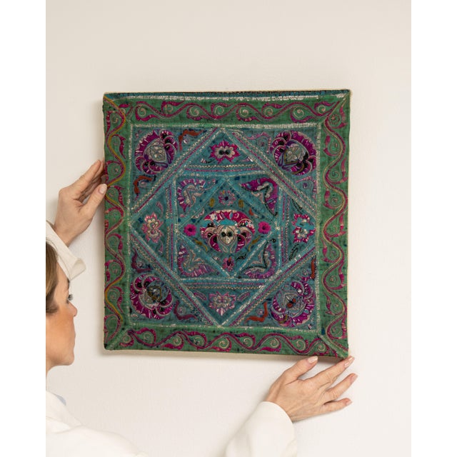 This early 20th century wall hanging from China is a wall hanging, housed in a textile frame. Its form follows honest,...