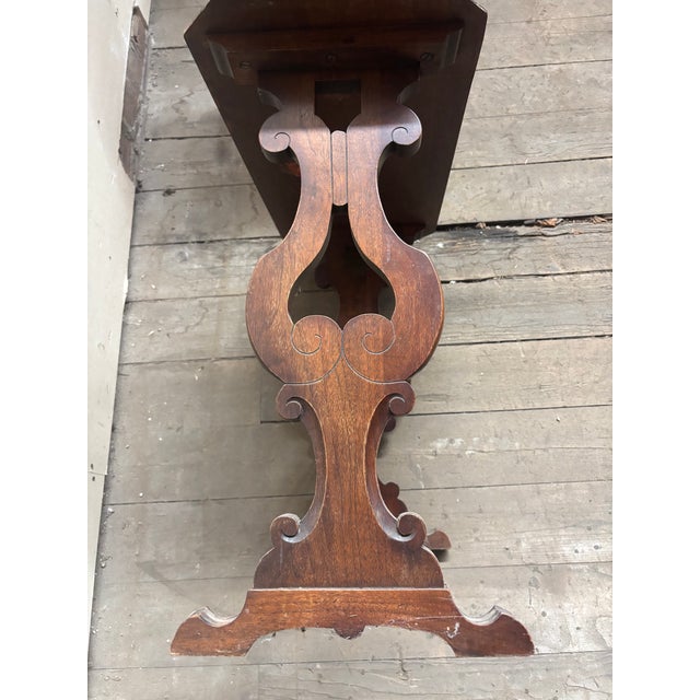 Darling console walnut table is in the Fratino style with lyre legs. This versatile size and style lends itself to many...