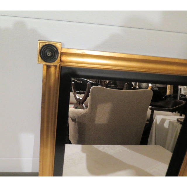 This Gilt wood Empire style mirror has Napoleonic medallions in the four corners of the wooden frame. It's a perfect size...