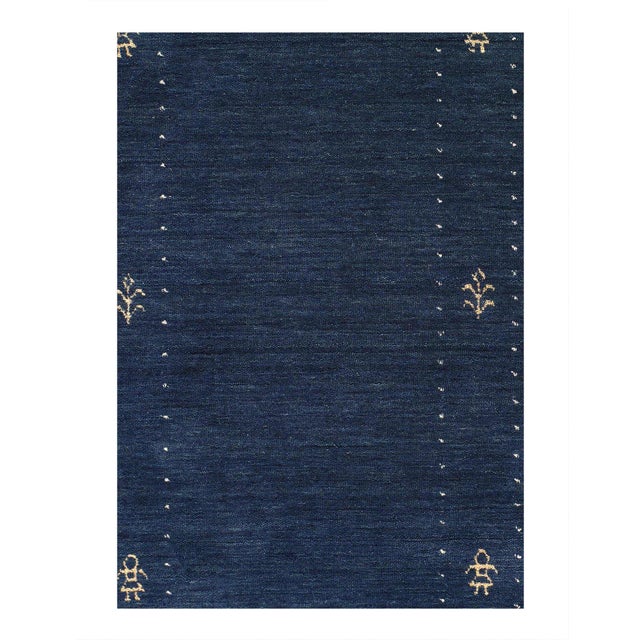 Gabbeh rugs are made by the nomadic Qashqai tribes . They are rough cut and long piled rugs of rich color and best quality...