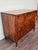 German Biedermeier-style walnut chest of drawers. Elegant ebonized side columns on both sides. It has three drawers, each...