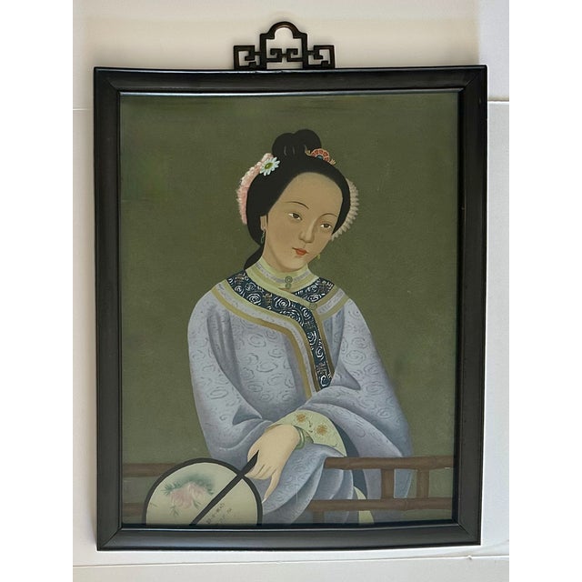 This is a Republic China period framed reverse painting on glass, depicting a beauty of wearing traditional Chinese...